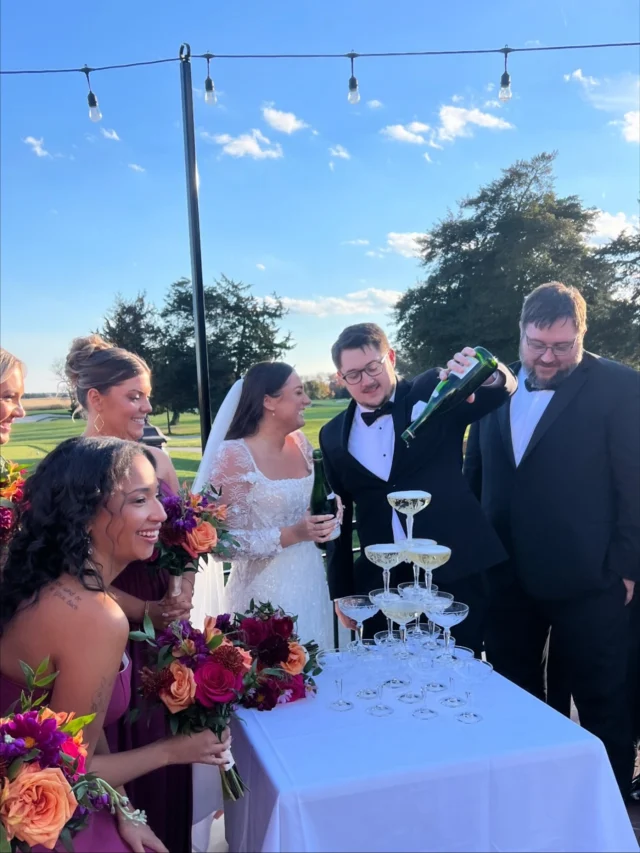 A toast under the open sky,
sunlight catching every crystal edge,
effortless luxury, framed in golden hour. 🥂 

#AtlanticCityCountryClubWedding